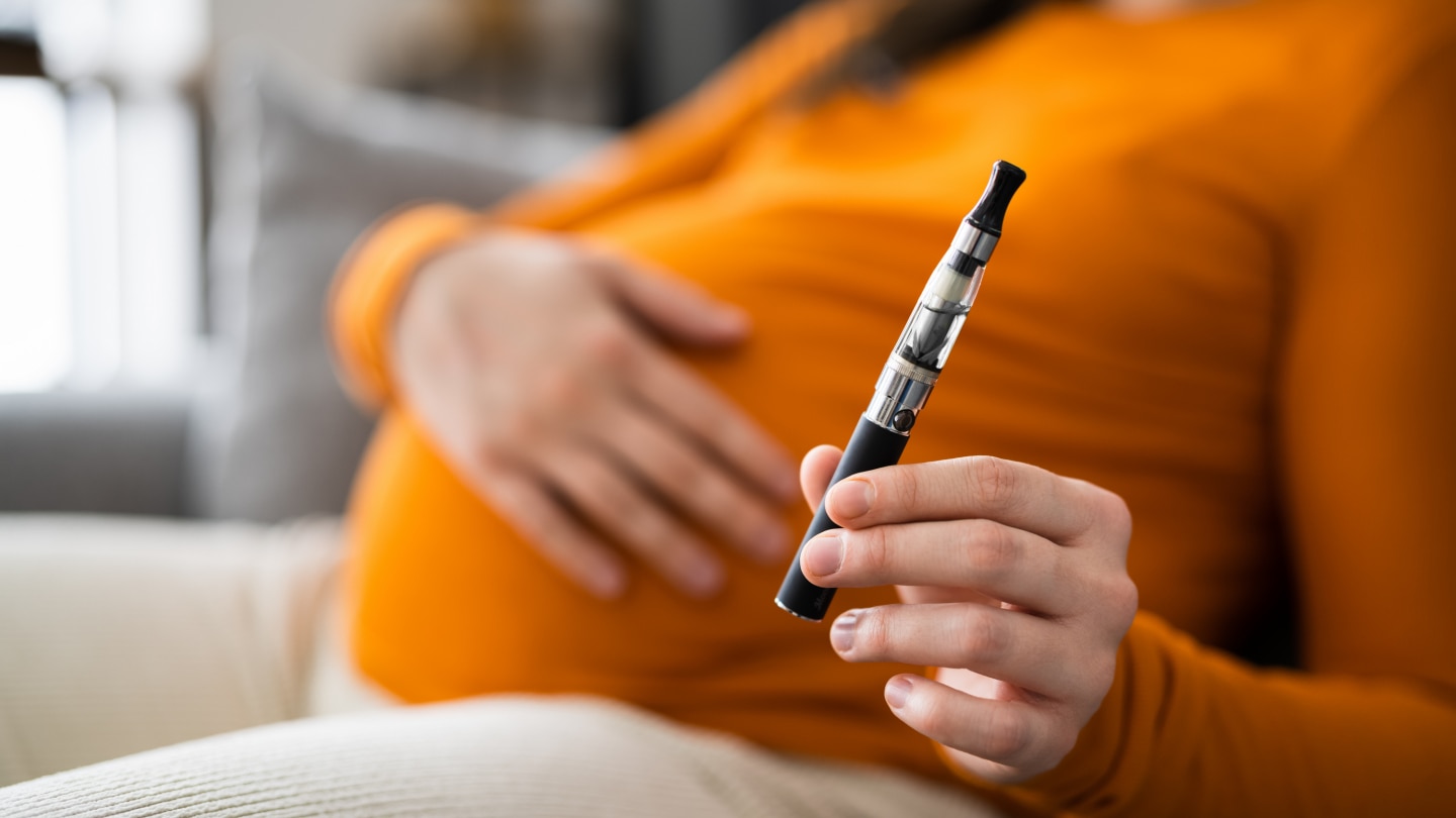 Pregnant Woman Smoking E Cigarette