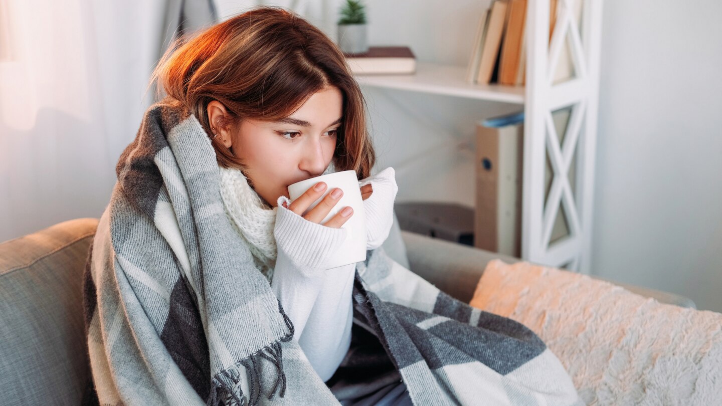 sick women drinking tea