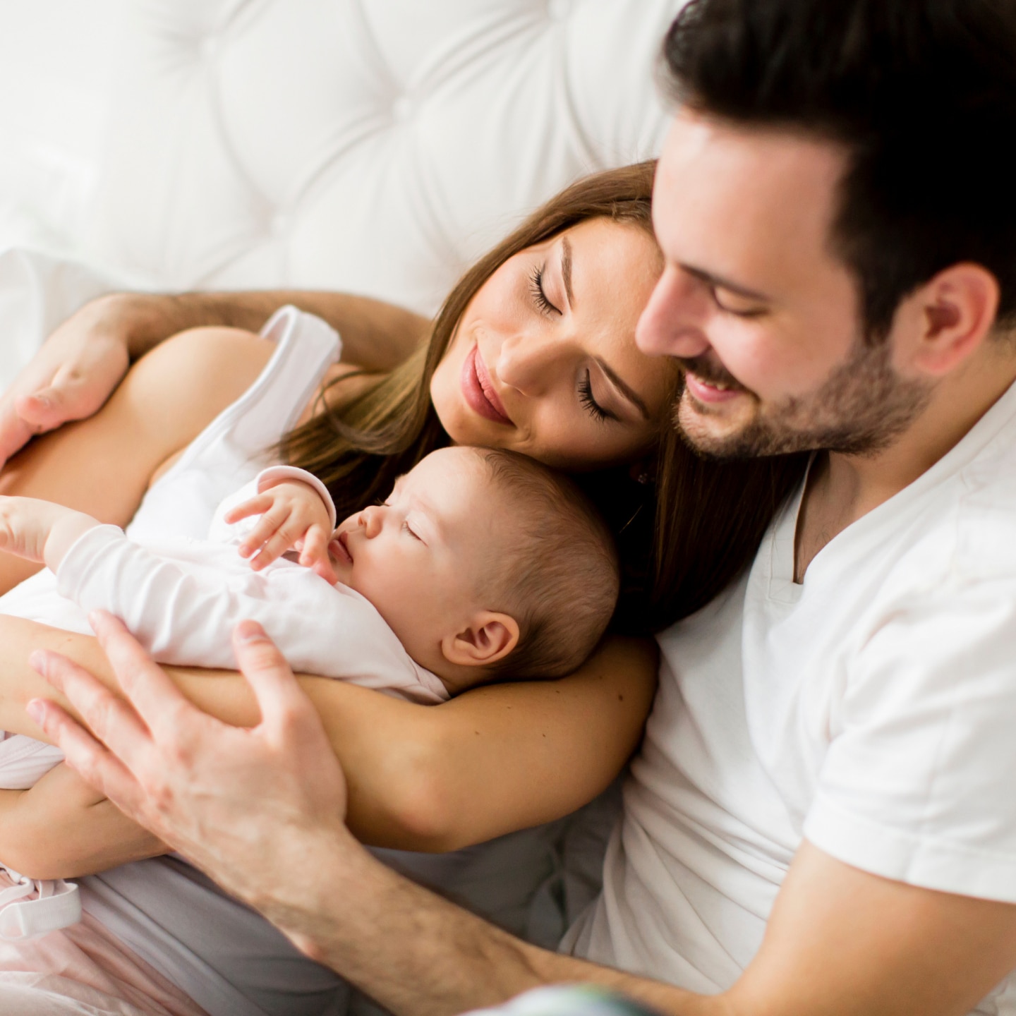 Happy family with newborn baby