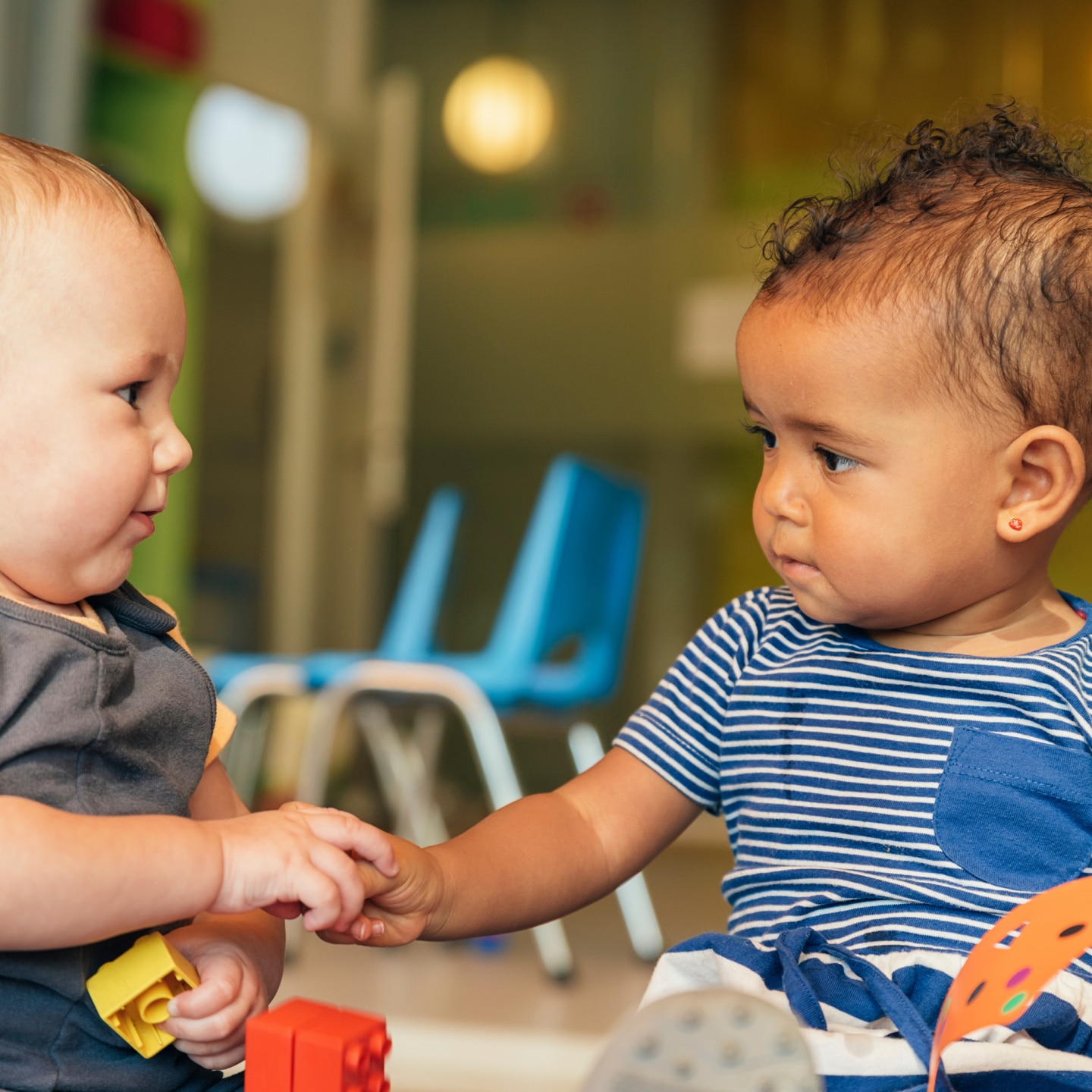 Babys playing together