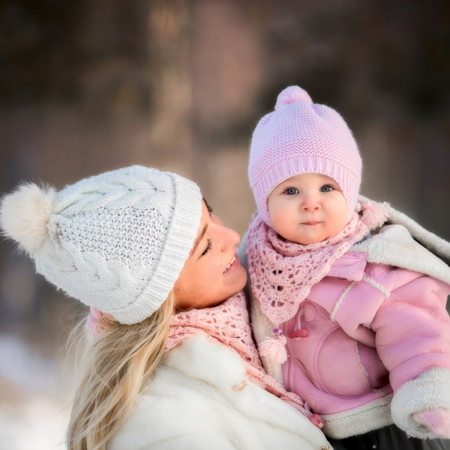 Beautiful Mother and daughter winter portrait