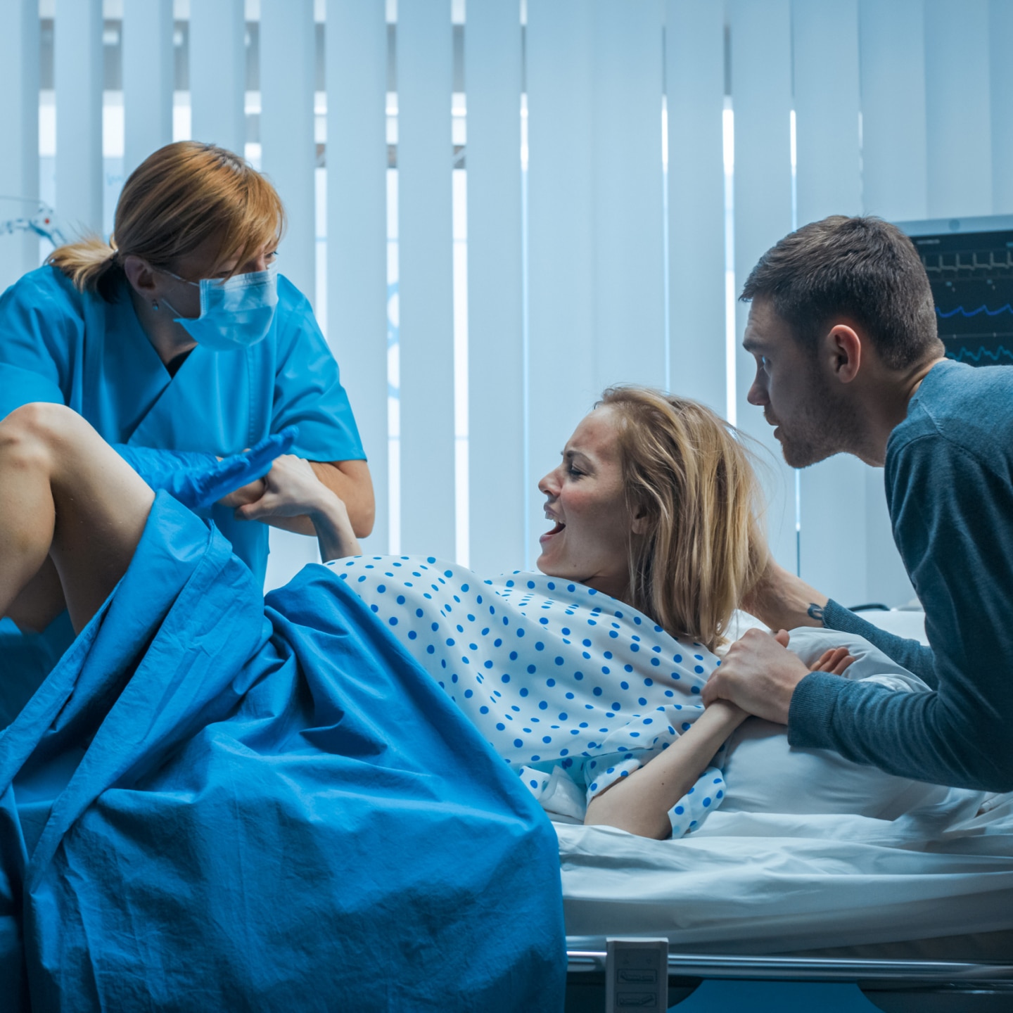 In the Hospital Woman in Labor Pushes to Give Birth