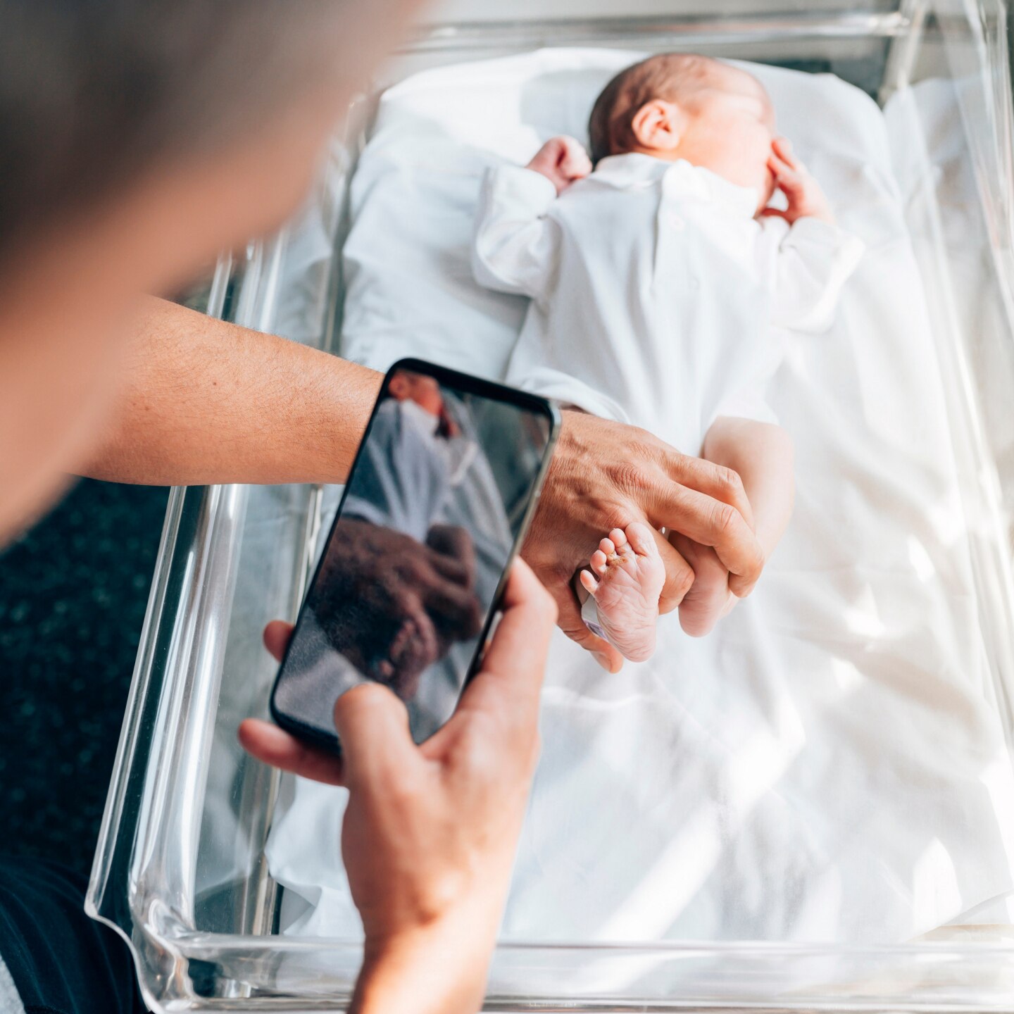 Father takes photo of son 