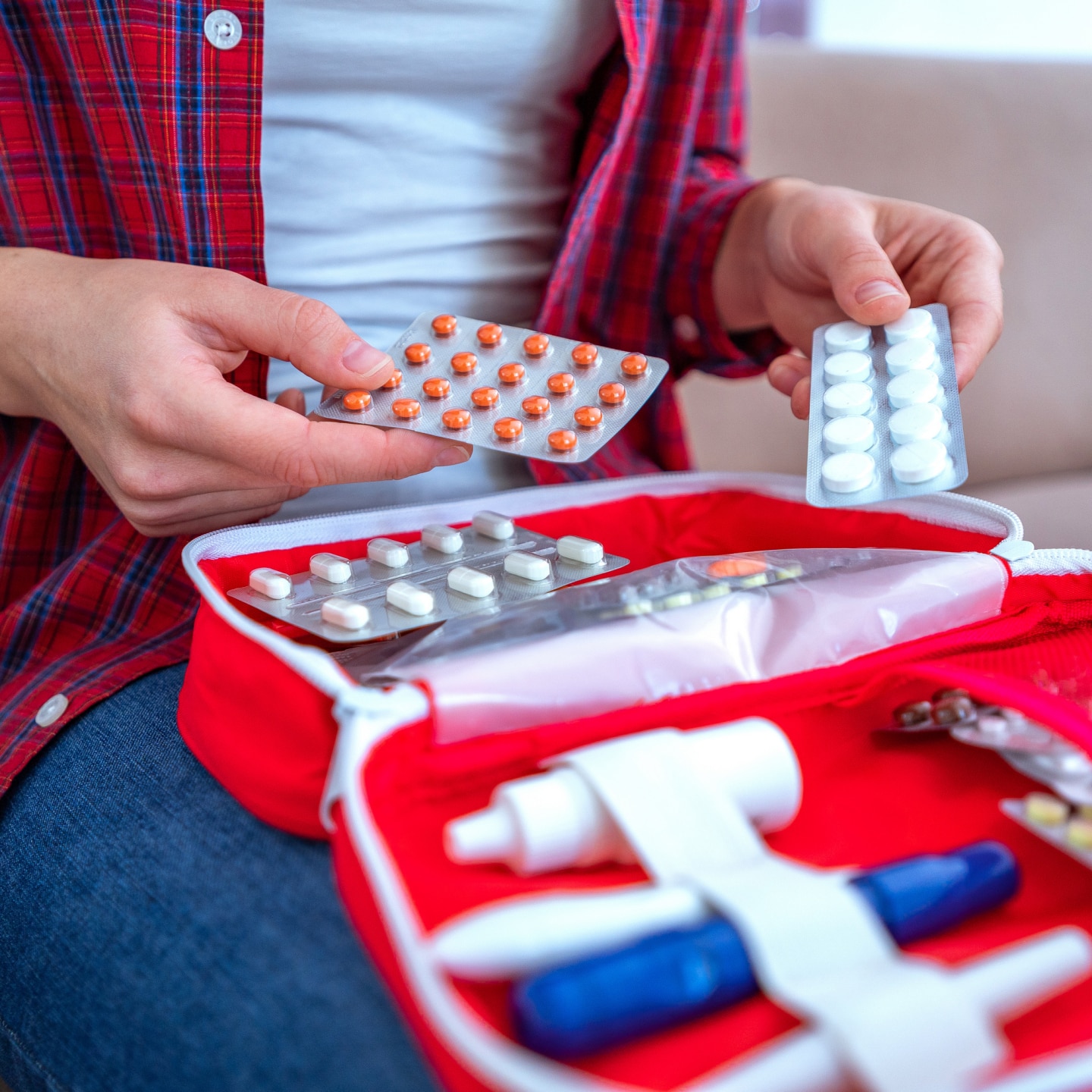 Medical first aid kit with medicine and pills for pain and illness