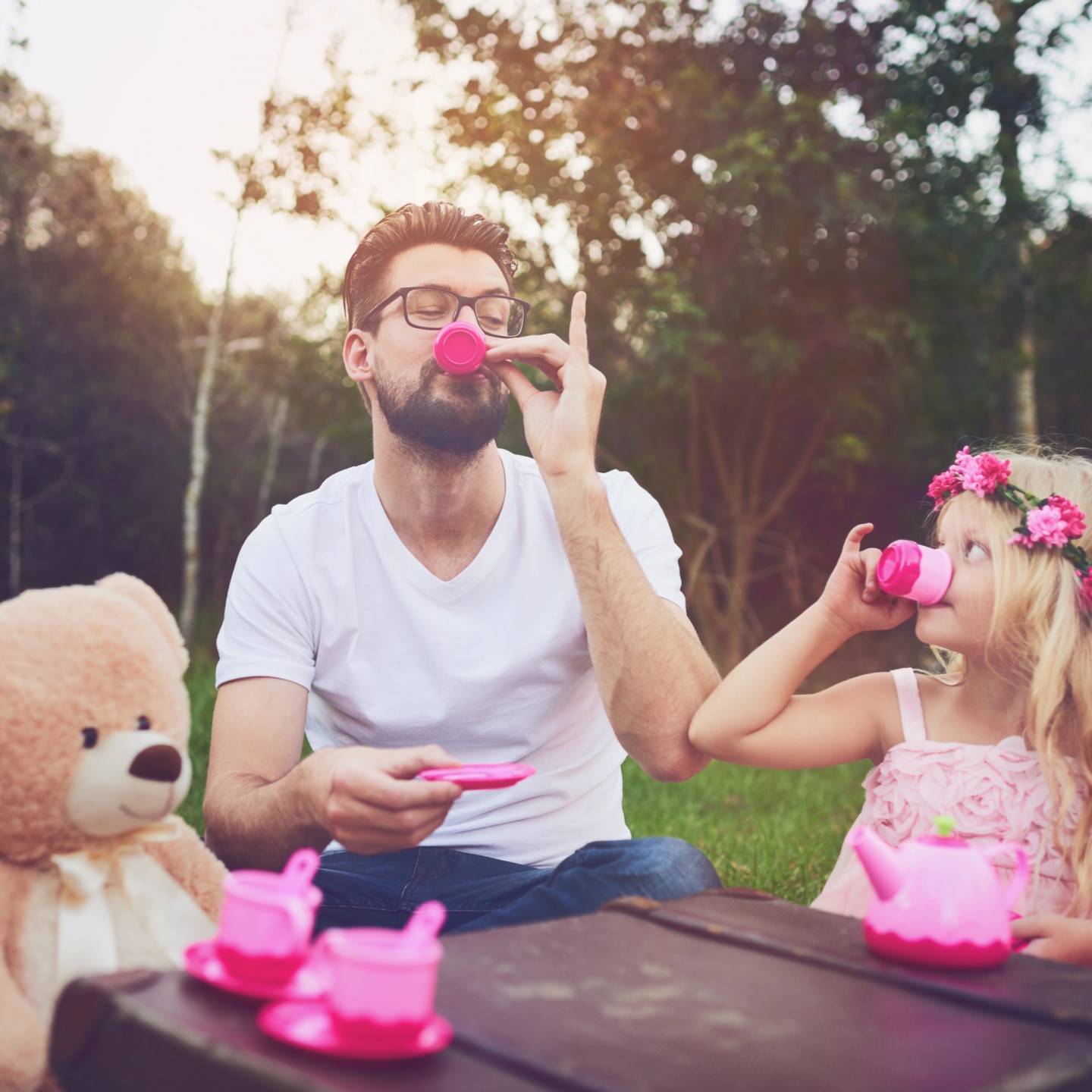 daughter and father having a tea party
