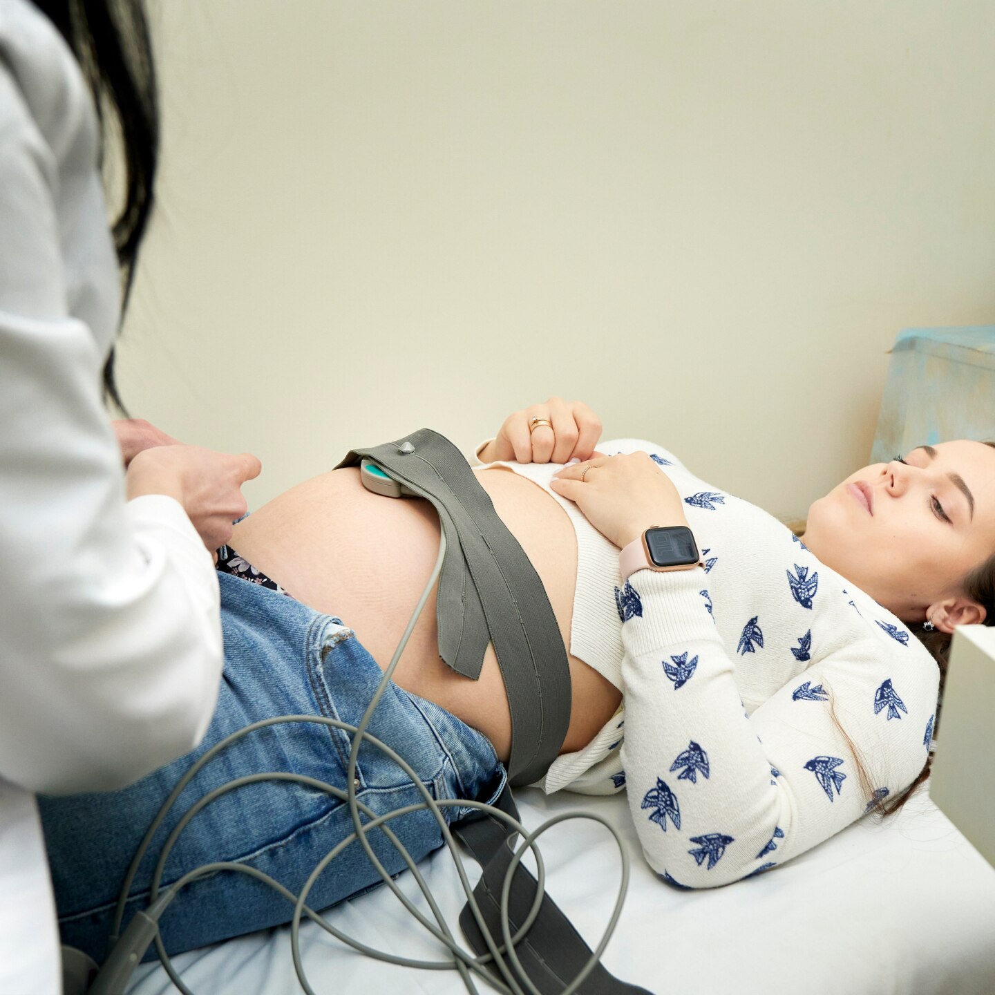 pregnant female visiting her own gynecologist in medical clinic