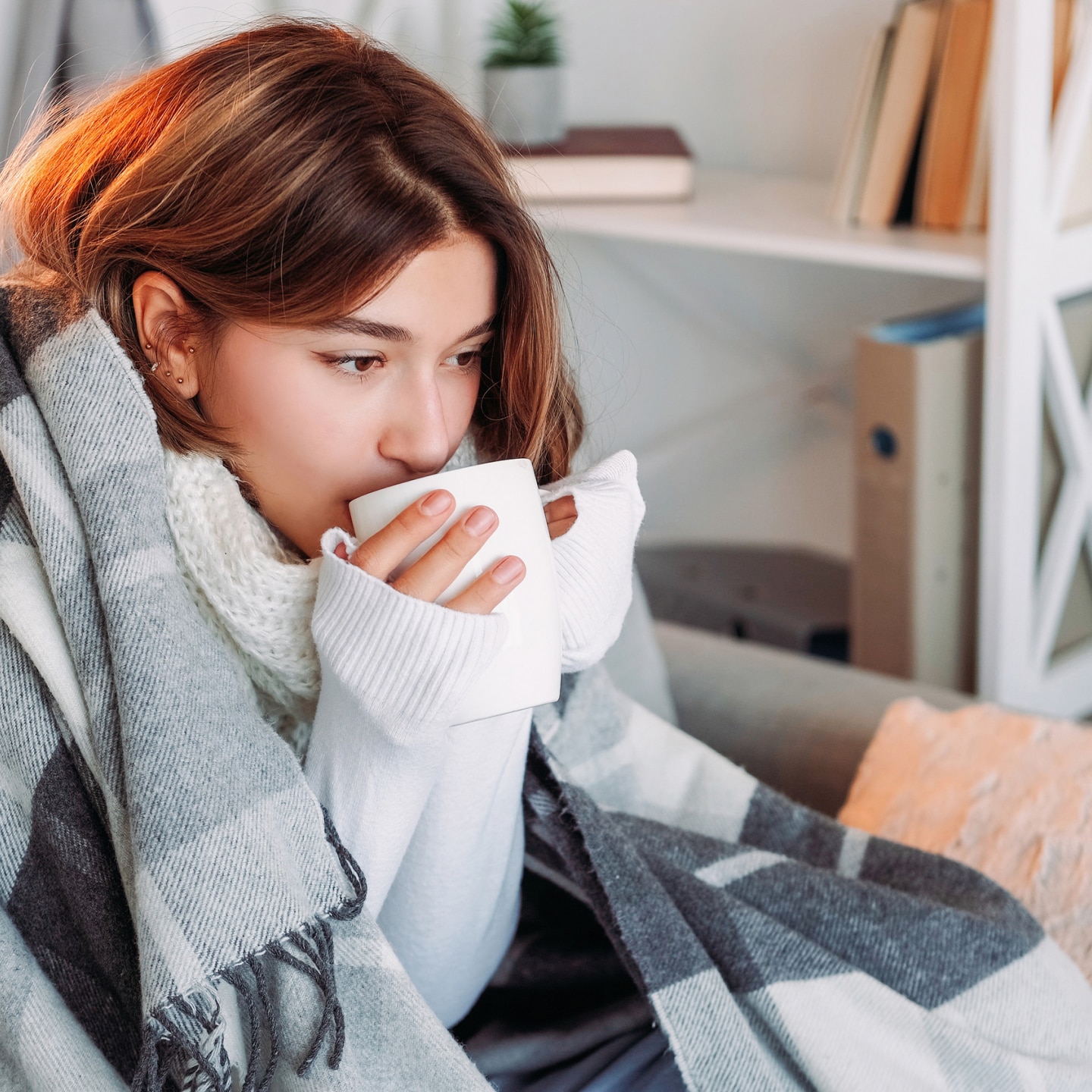 sick women drinking tea