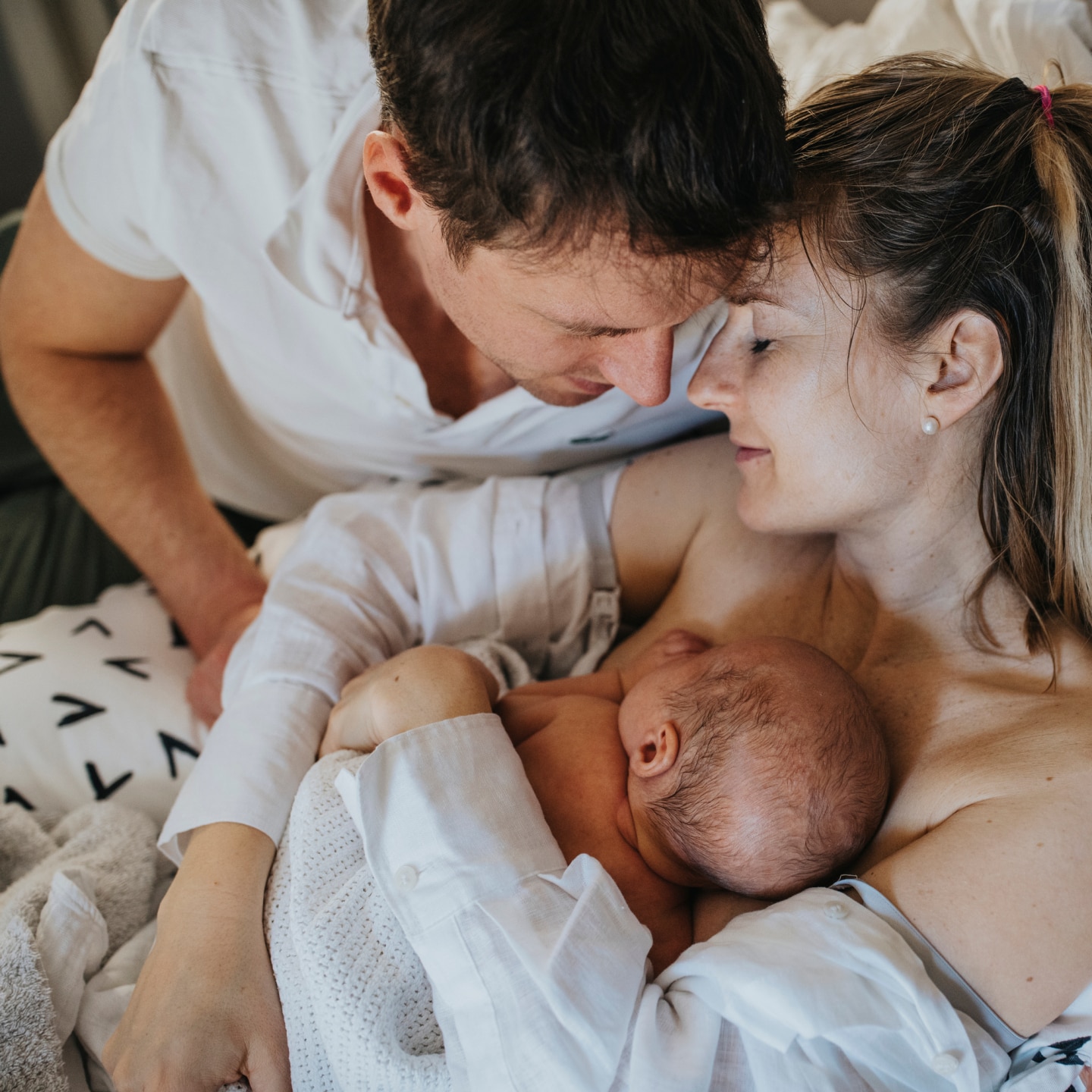 Happy family with newborn baby
